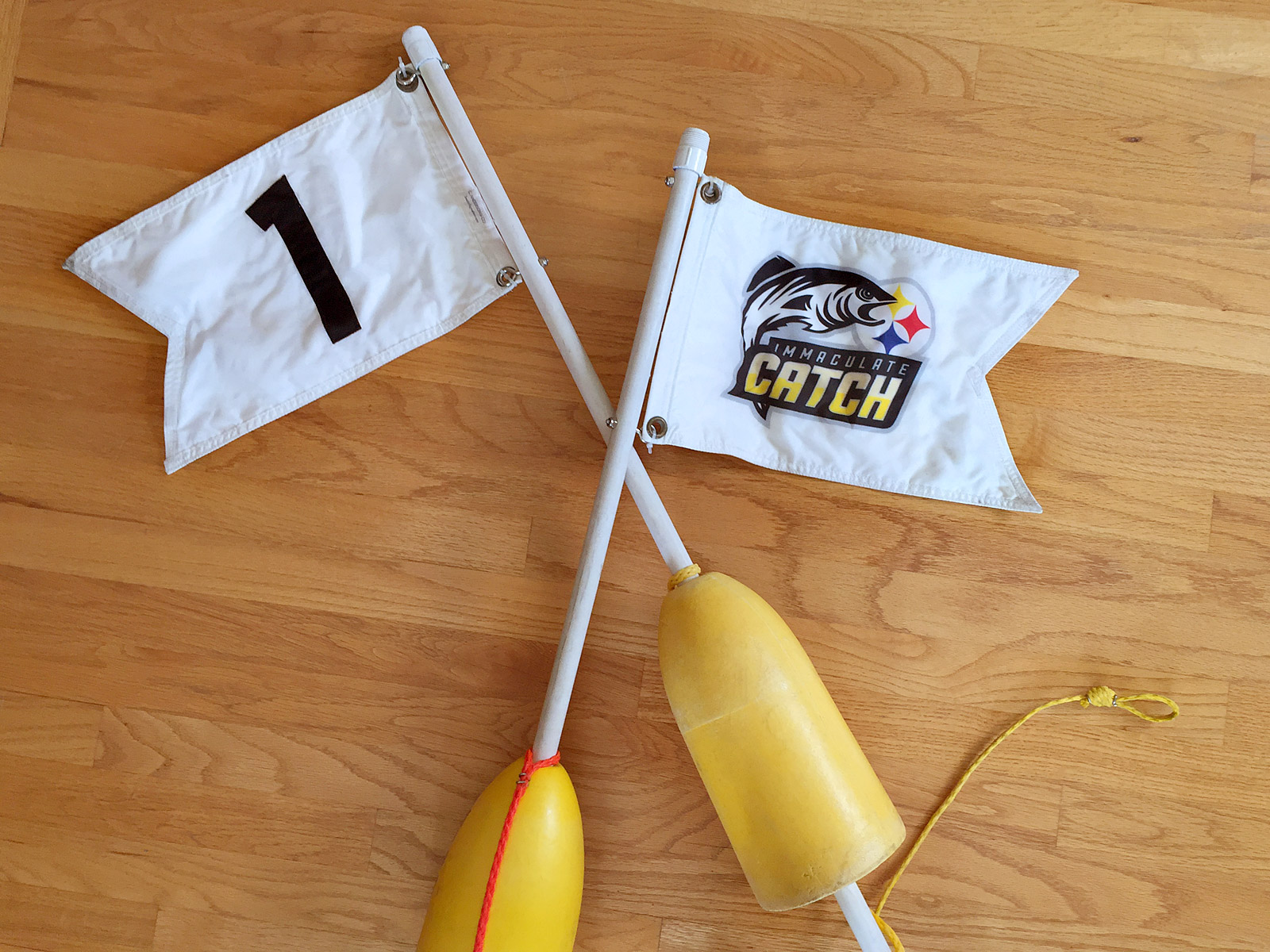 Immaculate Catch buoy flags